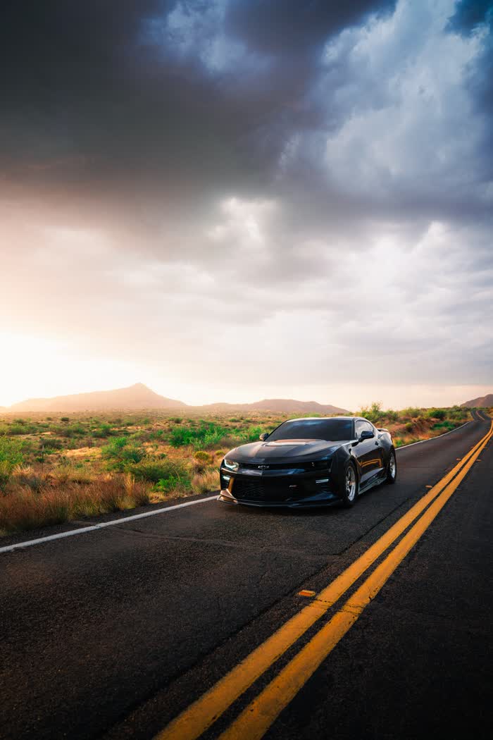 Exodus Issue One cover, a Camaro on a desert road at sunset